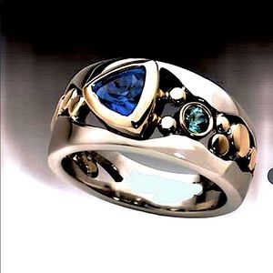 Blue Stone Adorned with Gold & Silver Accents